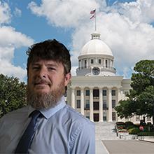 Photo of Randy Smith with Alabama state capitol in background