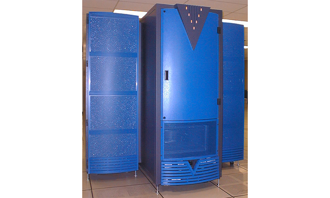 Front view of tall cobalt blue Cray SV1 supercomputer tower in server room